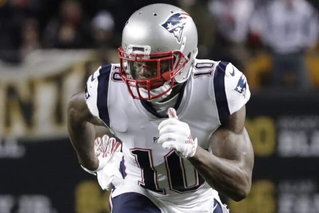 New England Patriots wide receiver Josh Gordon (10) runs a play during the second half of an NFL football game in Pittsburgh, Sunday, Dec. 16, 2018. (AP Photo/Don Wright)