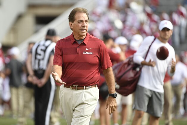 Alabama coach Nick Saban during pregame practice as the Crimson Tide prepare to play Arkansas in an NCAA college football game Saturday, Oct. 6, 2018, in Fayetteville, Ark. (AP Photo/Michael Woods)