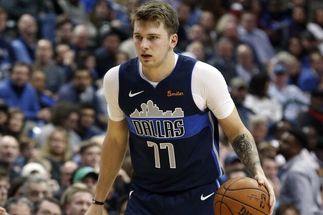 Dallas Mavericks forward Luka Doncic (77) moves the ball up the court against the Brooklyn Nets during the first half of an NBA basketball game in Dallas, Wednesday, Nov. 21, 2018. (AP Photo/Michael Ainsworth)