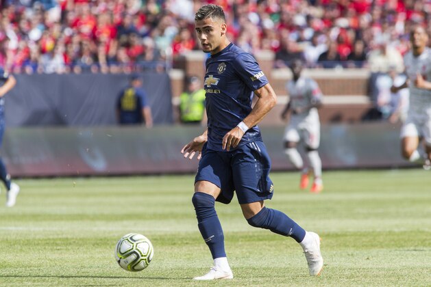 Manchester United midfielder Andreas Pereira sprints dribbling the ball during the first half of an International Champions Cup tournament soccer match against Liverpool at Michigan Stadium, Saturday, July 28, 2018, in Ann Arbor, Mich. (AP Photo/Tony Ding)