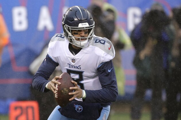 Tennessee Titans quarterback Marcus Mariota looks to pass against the New York Giants during the first half of an NFL football game, Sunday, Dec. 16, 2018, in East Rutherford, N.J. (AP Photo/Seth Wenig)
