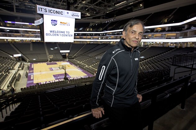 FILE - In this Sept. 27, 2016, file photo, Vivek Ranadive, the majority owner of the Sacramento Kings, poses in the new Golden 1 Center in Sacramento, Calif. The Kings are expected to bid on hosting the 2022 or 2023 NBA All-Star Game. (AP Photo/Rich Pedroncelli, file)