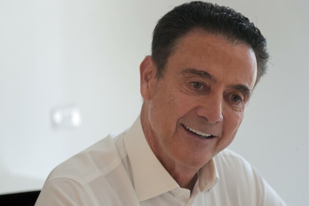 Former Louisville NCAA college basketball head coach Rick Pitino answers questions during an interview, Tuesday, Sept. 4, 2018, in New York. It's been nearly a year since Pitino was fired from Louisville after the school acknowledged that it's men's program was being investigated as part of a federal corruption probe. He wrote a book