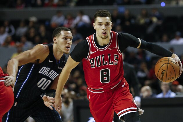 Chicago Bulls' Zach LaVine carries the ball past Orlando Magic's Aaron Gordon in their regular-season NBA basketball game in Mexico City, Thursday, Dec. 13, 2018. (AP Photo/Rebecca Blackwell) Chicago Bulls' Zach LaVine carries the ball past Orlando Magic's Aaron Gordon in their regular-season NBA basketball game in Mexico City, Thursday, Dec. 13, 2018. (AP Photo/Rebecca Blackwell)