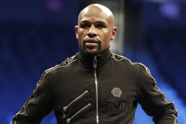 Floyd Mayweather Jr., attends a news conference after a super welterweight boxing match against Conor McGregor, Sunday, Aug. 27, 2017, in Las Vegas. (AP Photo/Isaac Brekken)