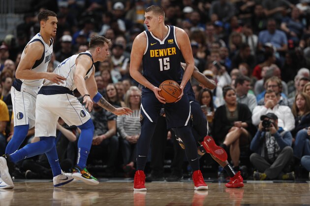 Denver Nuggets center Nikola Jokic (15) in the first half of an NBA basketball game Tuesday, Dec. 18, 2018, in Denver. (AP Photo/David Zalubowski)