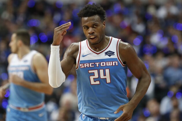 Sacramento Kings guard Buddy Hield (24) salutes after hitting a three pointer during the second half of an NBA basketball game against the Dallas Mavericks in Dallas, Sunday, Dec. 16, 2018. The Kings won 120-113. (AP Photo/LM Otero)