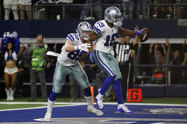 Dallas Cowboys wide receiver Amari Cooper (19) celebrates with teammate Blake Jarwin (89) after he scores a touchdown in overtime of an NFL football game against the Philadelphia Eagles, in Arlington, Texas, Sunday, Dec. 9, 2018. Dallas won 29-23. (AP Photo/Ron Jenkins)