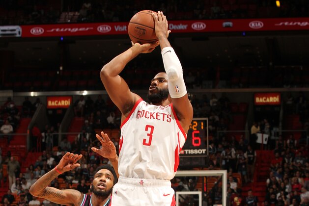 MIAMI, FL - DECEMBER 20: Chris Paul #3 of the Houston Rockets shoots the ball against the Miami Heat on December 20, 2018 at American Airlines Arena in Miami, Florida. NOTE TO USER: User expressly acknowledges and agrees that, by downloading and or using this Photograph, user is consenting to the terms and conditions of the Getty Images License Agreement. Mandatory Copyright Notice: Copyright 2018 NBAE (Photo by Oscar Baldizon/NBAE via Getty Images)