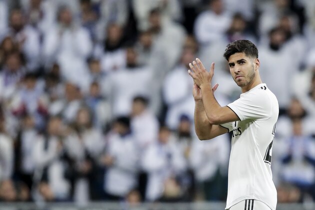 MADRID, SPAIN - DECEMBER 15: Marco Asensio of Real Madrid during the La Liga Santander  match between Real Madrid v Rayo Vallecano at the Santiago Bernabeu on December 15, 2018 in Madrid Spain (Photo by David S. Bustamante/Soccrates/Getty Images)