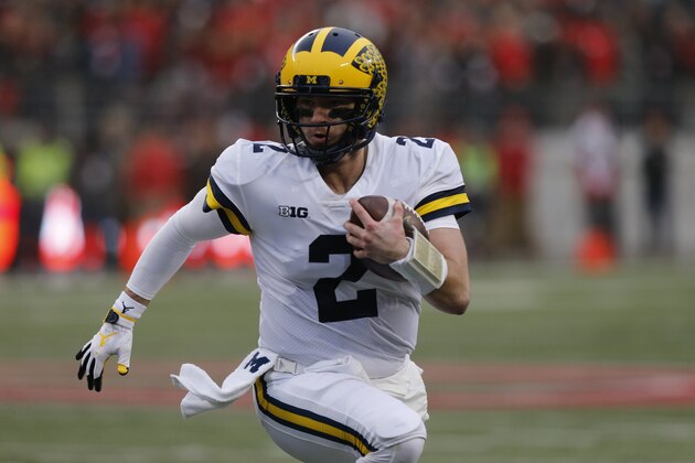 Michigan quarterback Shea Patterson plays against Ohio State during an NCAA college football game Saturday, Nov. 24, 2018, in Columbus, Ohio. (AP Photo/Jay LaPrete)