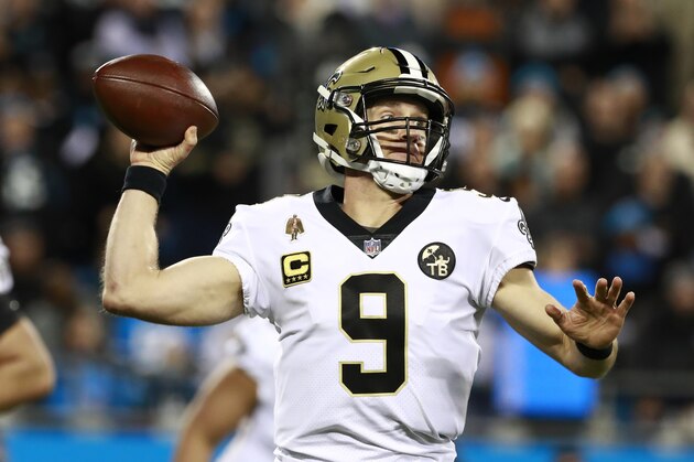 FILE - In this Dec. 17, 2018 file photo New Orleans Saints' Drew Brees (9) looks to pass against the Carolina Panthers in the first half of an NFL football game in Charlotte, N.C. Brees is the starting quarterback for the NFC backed by Green Bay’s Aaron Rodgers and the Rams’ Jared Goff for the Pro Bowl which will be played Jan. 27 in Orlando. (AP Photo/Jason E. Miczek, file)