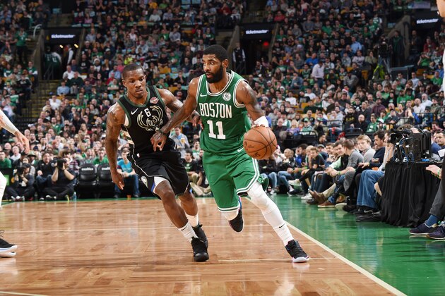 BOSTON, MA - DECEMBER 21: Kyrie Irving #11 of the Boston Celtics drives to the basket against the Milwaukee Bucks on December 21, 2018 at the TD Garden in Boston, Massachusetts.  NOTE TO USER: User expressly acknowledges and agrees that, by downloading and or using this photograph, User is consenting to the terms and conditions of the Getty Images License Agreement. Mandatory Copyright Notice: Copyright 2018 NBAE  (Photo by Brian Babineau/NBAE via Getty Images)
