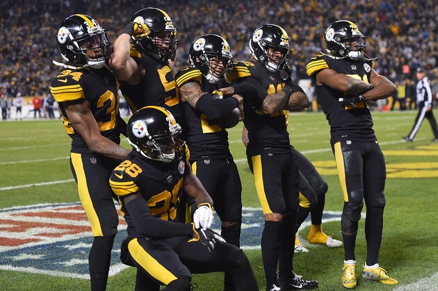 PITTSBURGH, PA - DECEMBER 16: Members of the Pittsburgh Steelers defense reacts after an interception by Joe Haden #23 in the fourth quarter during the game against the New England Patriots at Heinz Field on December 16, 2018 in Pittsburgh, Pennsylvania. (Photo by Joe Sargent/Getty Images)