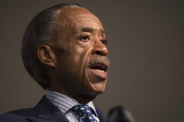 FILE - In this June 18, 2015 file photo, Rev. Al Sharpton addresses the media during a news conference at the National Action Network headquarters in New York. President Donald Trump's former personal lawyer Michael Cohen and the Rev. Al Sharpton have met to renew a long acquaintance — and they've made a point of letting the public know. Both tweeted about their get-together Friday, July 20, 2018. AP Photo/Kevin Hagen, File)