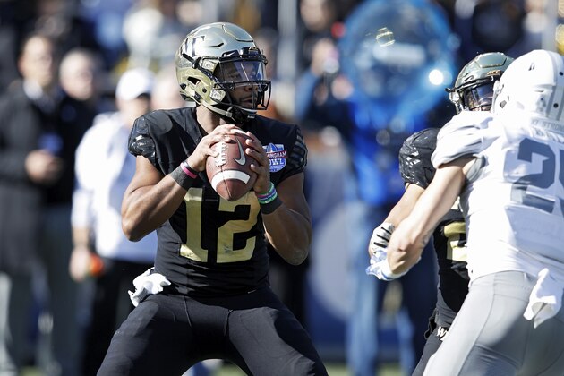 BIRMINGHAM, AL - DECEMBER 22: Jamie Newman #12 of the Wake Forest Demon Deacons looks to pass against the Memphis Tigers in the first quarter of the Birmingham Bowl at Legion Field on December 22, 2018 in Birmingham, Alabama. (Photo by Joe Robbins/Getty Images)