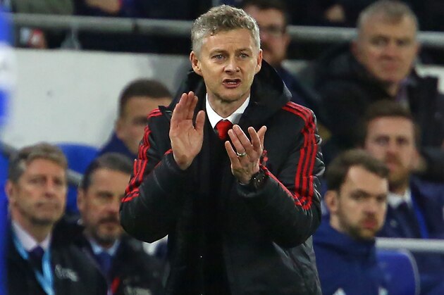 Manchester United's Norwegian caretaker manager Ole Gunnar Solskjaer gestures on the touchline during the English Premier League football match between between Cardiff City and Manchester United at Cardiff City Stadium in Cardiff, south Wales on  December 22, 2018. (Photo by Geoff CADDICK / AFP) / RESTRICTED TO EDITORIAL USE. No use with unauthorized audio, video, data, fixture lists, club/league logos or 'live' services. Online in-match use limited to 120 images. An additional 40 images may be used in extra time. No video emulation. Social media in-match use limited to 120 images. An additional 40 images may be used in extra time. No use in betting publications, games or single club/league/player publications. /         (Photo credit should read GEOFF CADDICK/AFP/Getty Images)
