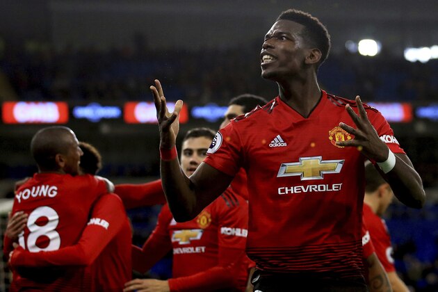 Manchester United midfielder Paul Pogba celebrates the fifth goal against Cardiff City during the English Premier League match between Cardiff City and Manchester United at the Cardiff City Stadium in Cardiff, Wales, Saturday Dec. 22, 2018. (AP Photo/ Jon Super)