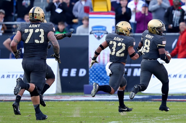 FORT WORTH, TEXAS - DECEMBER 22: Kelvin Hopkins Jr. #8 of the Army Black Knights carries the ball and scores a touchdown against the Houston Cougars in the first quarter of the Lockheed Martin Armed Forces Bowl at Amon G. Carter Stadium on December 22, 2018 in Fort Worth, Texas. (Photo by Tom Pennington/Getty Images)