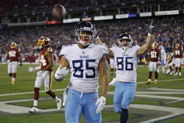 Tennessee Titans tight end MyCole Pruitt (85) flips the ball over his shoulder after he scored a touchdown on a 2-yard pass reception against the Washington Redskins in the second half of an NFL football game Saturday, Dec. 22, 2018, in Nashville, Tenn. (AP Photo/James Kenney)
