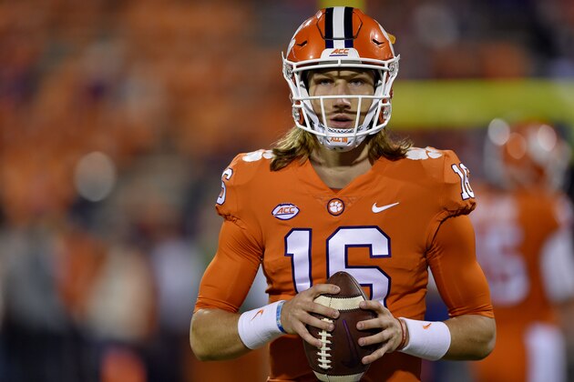 Clemson quarterback Trevor Lawrence warms up before the start of an NCAA college football game against South Carolina, Saturday, Nov. 24, 2018, in Clemson, S.C. (AP Photo/Richard Shiro)