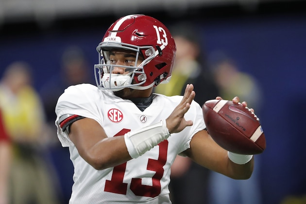 Alabama quarterback Tua Tagovailoa (13) warms up ahead of the Southeastern Conference championship NCAA college football game between Georgia and Alabama, Saturday, Dec. 1, 2018, in Atlanta. (AP Photo/John Bazemore)