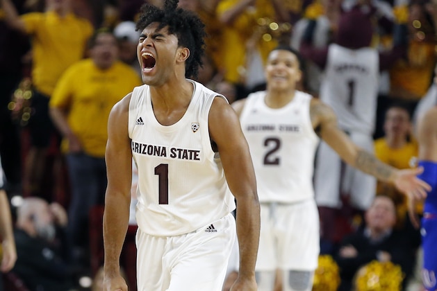 Arizona State guard Remy Martin (1) celebrates in the second half of the team's NCAA college basketball game against Kansas, Saturday, Dec. 22, 2018, in Tempe, Ariz. Arizona State won 80-76. (AP Photo/Rick Scuteri)