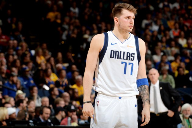 OAKLAND, CA - DECEMBER 22:  Luka Doncic #77 of the Dallas Mavericks looks on against the Golden State Warriors on December 22, 2018 at ORACLE Arena in Oakland, California. NOTE TO USER: User expressly acknowledges and agrees that, by downloading and or using this photograph, user is consenting to the terms and conditions of Getty Images License Agreement. Mandatory Copyright Notice: Copyright 2018 NBAE (Photo by Noah Graham/NBAE via Getty Images)