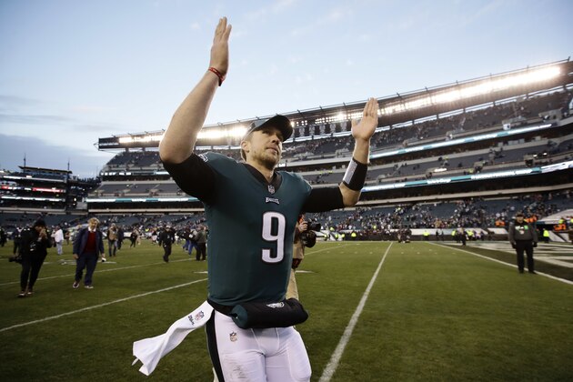 Philadelphia Eagles' Nick Foles celebrates as he runs off the field after an NFL football game against the Houston Texans, Sunday, Dec. 23, 2018, in Philadelphia. Philadelphia won 32-30. (AP Photo/Matt Rourke)