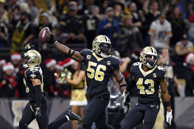 New Orleans Saints outside linebacker Demario Davis (56) celebrates after recoveirign a fumble in the final minute of the second half of an NFL football game against the Pittsburgh Steelers in New Orleans, Sunday, Dec. 23, 2018. The Saints won 31-28, clinching the top seed for the NFC and home field advantage for the playoffs. (AP Photo/Bill Feig)
