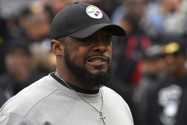 OAKLAND, CA - DECEMBER 09:  Head coach Mike Tomlin of the Pittsburgh Steelers looks on while his team warms up prior to the start of an NFL football game against the Oakland Raiders at Oakland-Alameda County Coliseum on December 9, 2018 in Oakland, California.  (Photo by Thearon W. Henderson/Getty Images)