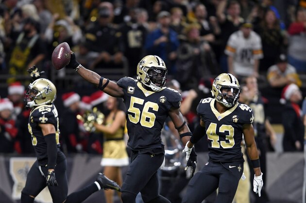 New Orleans Saints outside linebacker Demario Davis (56) celebrates after recoveirign a fumble in the final minute of the second half of an NFL football game against the Pittsburgh Steelers in New Orleans, Sunday, Dec. 23, 2018. The Saints won 31-28, clinching the top seed for the NFC and home field advantage for the playoffs. (AP Photo/Bill Feig)