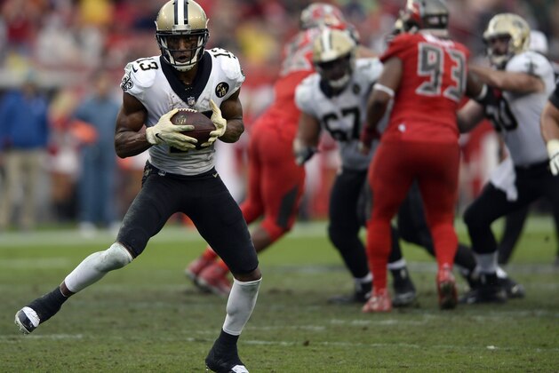 New Orleans Saints wide receiver Michael Thomas (13) makes a catch against the Tampa Bay Buccaneers during the second half of an NFL football game Sunday, Dec. 9, 2018, in Tampa, Fla. (AP Photo/Jason Behnken)
