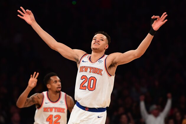 NEW YORK, NEW YORK - DECEMBER 21: Kevin Knox #20 of the New York Knicks reacts after making a three-point basket during the first quarter of the game against Atlanta Hawks at Madison Square Garden on December 21, 2018 in New York City. NOTE TO USER: User expressly acknowledges and agrees that, by downloading and or using this photograph, User is consenting to the terms and conditions of the Getty Images License Agreement. (Photo by Sarah Stier/Getty Images)