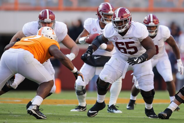 KNOXVILLE, TN - OCTOBER 20: Deonte Brown #65 of the Alabama Crimson Tide comes off the ball during the first half of the game between the Alabama Crimson Tide and the Tennessee Volunteers at Neyland Stadium on October 20, 2018 in Knoxville, Tennessee. Alabama won 58-21. (Photo by Donald Page/Getty Images)