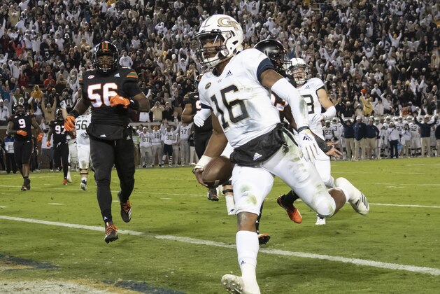 Georgia Tech quarterback TaQuon Marshall (16) scores a touchdown during the first half of an NCAA college football game against Miami, Saturday, Nov. 10, 2018, in Atlanta. (AP Photo/John Amis)