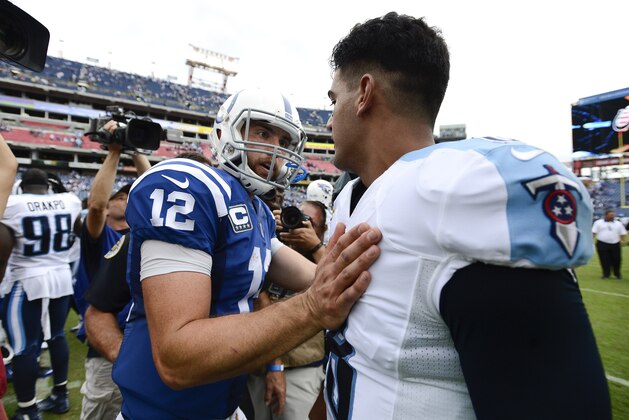 Indianapolis Colts quarterback Andrew Luck (12) meets Tennessee Titans quarterback Marcus Mariota (8) on the field after the Colts beat the Titans 35-33 in an NFL football game Sunday, Sept. 27, 2015, in Nashville, Tenn. (AP Photo/Mark Zaleski)