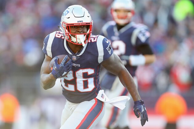 FOXBOROUGH, MA - DECEMBER 23:  Sony Michel #26 of the New England Patriots runs with the ball during the first half against the Buffalo Bills at Gillette Stadium on December 23, 2018 in Foxborough, Massachusetts.  (Photo by Maddie Meyer/Getty Images)