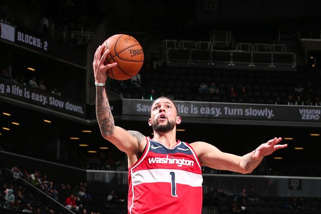 NEW YORK, NY -  DECEMBER 14: Austin Rivers #1 of the Washington Wizards drives to the basket during the game against the Brooklyn Nets on December 14, 2018 at Barclays Center in New York, NY. NOTE TO USER: User expressly acknowledges and agrees that, by downloading and or using this Photograph, user is consenting to the terms and conditions of the Getty Images License Agreement. Mandatory Copyright Notice: Copyright 2018 NBAE (Photo by Ned Dishman/NBAE via Getty Images)