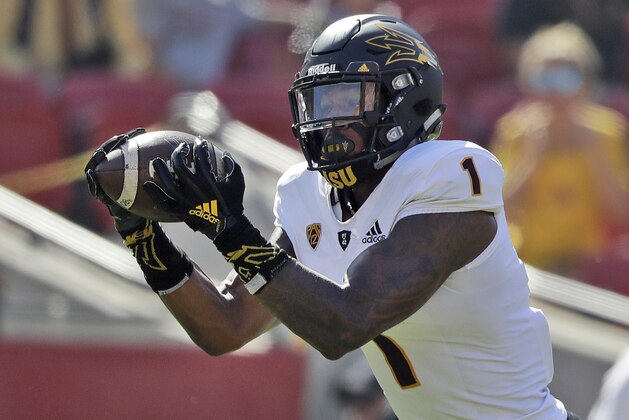 FILE - In this Oct. 27, 2018, file photo, Arizona State wide receiver N'Keal Harry makes a touchdown catch against Southern California during the first half of an NCAA college football game in Los Angeles. Harry announced Monday, Nov. 26, 2018, he will skip his senior season to enter the NFL draft. (AP Photo/Marcio Jose Sanchez, File)
