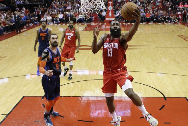 Houston Rockets guard James Harden, right, drives to the basket as Oklahoma City Thunder center Steven Adams, left, watches during the first half of an NBA basketball game, Tuesday, Dec. 25, 2018, in Houston. (AP Photo/Eric Christian Smith) Houston Rockets guard James Harden, right, drives to the basket as Oklahoma City Thunder center Steven Adams, left, watches during the first half of an NBA basketball game, Tuesday, Dec. 25, 2018, in Houston. (AP Photo/Eric Christian Smith)
