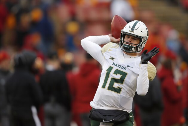 Baylor quarterback Charlie Brewer warms up before an NCAA college football game against Iowa State, Saturday, Nov. 10, 2018, in Ames. (AP Photo/Matthew Putney)