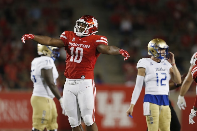 HOUSTON, TX - OCTOBER 04:  Ed Oliver #10 of the Houston Cougars celebrates after a tackle in the first half against the Tulsa Golden Hurricane at TDECU Stadium on October 4, 2018 in Houston, Texas.  (Photo by Tim Warner/Getty Images)