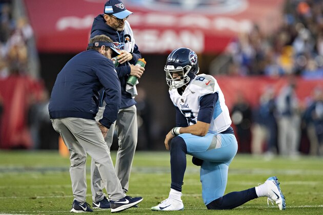 NASHVILLE, TN - DECEMBER 22:  Marcus Mariota #8 of the Tennessee Titans rests on one knee after a hard tackle during a game against the Washington Redskins at Nissan Stadium on December 22, 2018 in Nashville, Tennessee.  The Titans defeated the Redskins 25-16.   (Photo by Wesley Hitt/Getty Images)