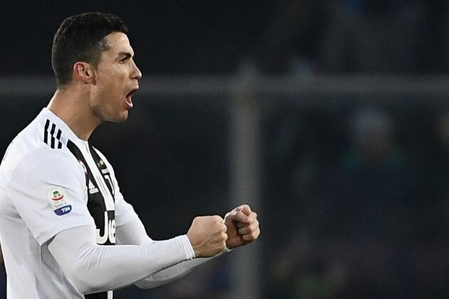 Juventus' Portuguese forward Cristiano Ronaldo celebrates after scoring an equalizer during the Italian Serie A football Match Atalanta Bergamo vs Juventus on December 26, 2018 at the Atleti Azzurri d'Italia stadium in Bergamo. (Photo by Marco BERTORELLO / AFP)        (Photo credit should read MARCO BERTORELLO/AFP/Getty Images)
