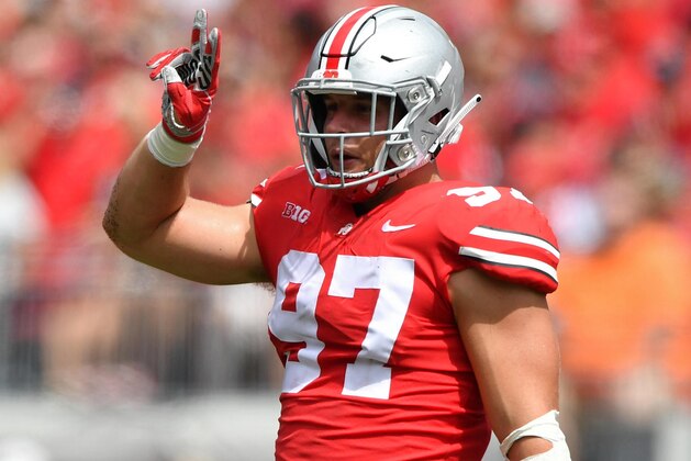 COLUMBUS, OH - SEPTEMBER 1:  Nick Bosa #97 of the Ohio State Buckeyes defends against the Oregon State Beavers at Ohio Stadium on September 1, 2018 in Columbus, Ohio. Ohio State defeated Oregon State 77-31.  (Photo by Jamie Sabau/Getty Images)