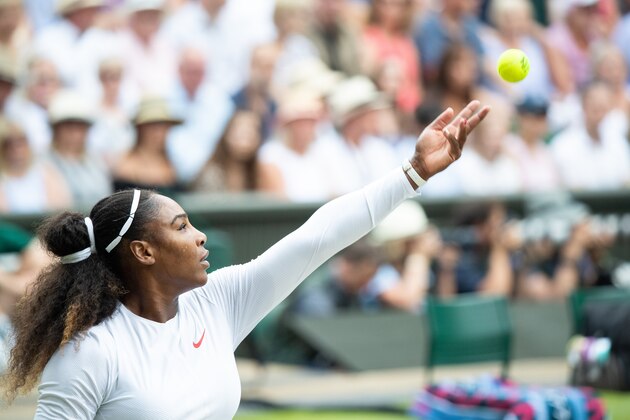 LONDON - ENGLAND JULY 14:  Serena Williams of USA in action against Angelique Kerber of Germany (not pictured) in the Ladies Singles Final on center court during The Wimbledon Lawn Tennis Championship at the All England Lawn Tennis and Croquet Club at Wimbledon on  July 14, 2018 in London, England. (Photo by Simon Bruty/Any Chance/Getty Images)