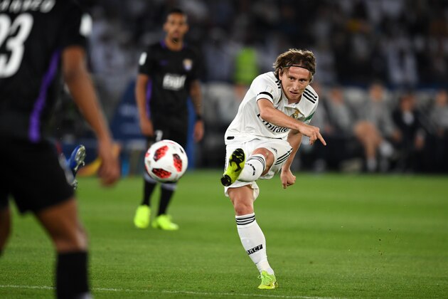 ABU DHABI, UNITED ARAB EMIRATES - DECEMBER 22: Luka Modric of Real Madrid scores his side's first goal during the match between Real Madrid and Al Ain on December 22, 2018 in Abu Dhabi, United Arab Emirates. (Photo by Etsuo Hara/Getty Images)