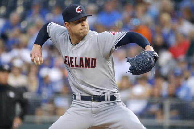 Cleveland Indians starting pitcher Corey Kluber throws during the first inning of a baseball game against the Kansas City Royals on Saturday, Sept. 29, 2018, in Kansas City, Mo. (AP Photo/Charlie Riedel)