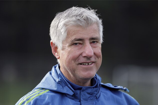 FILE - In this Oct. 27, 2015, file photo, then-Seattle Sounders head coach Sigi Schmid walks off the field following an MLS soccer training session, in Tukwila, Wash. Schmid, the winningest coach in Major League Soccer history who led the LA Galaxy to the first of five MLS Cup titles, has stepped down as coach of the Galaxy. The team said Schmid's resignation was effective immediately Monday, Sept. 10, 2018. Dominic Kinnear was named the interim head coach for the remainder of the season. (AP Photo/Ted S. Warren, File)
